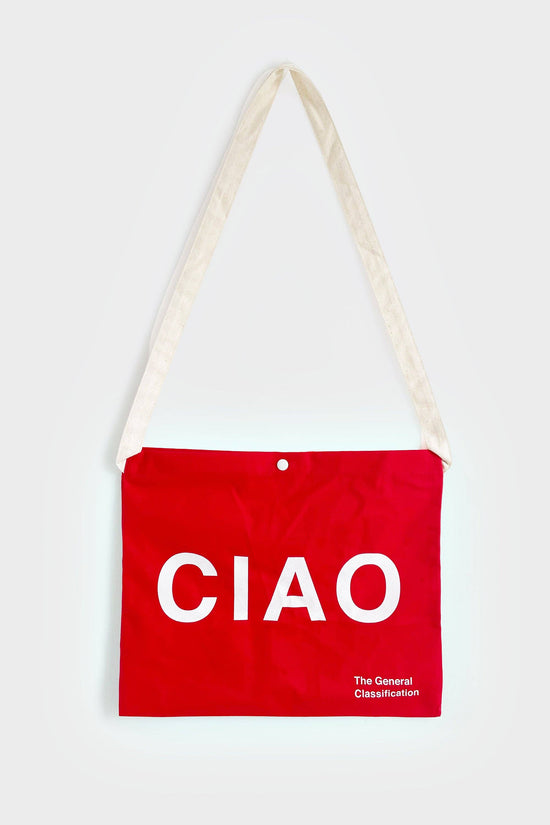 Red reusable canvas tote bag with white handles and bold white "Ciao" and ‘Arrivederci’ graphic by The General Classification. Eco-friendly cotton shopping bag with modern minimalist design, ideal for everyday use, groceries, travel, and casual fashion.