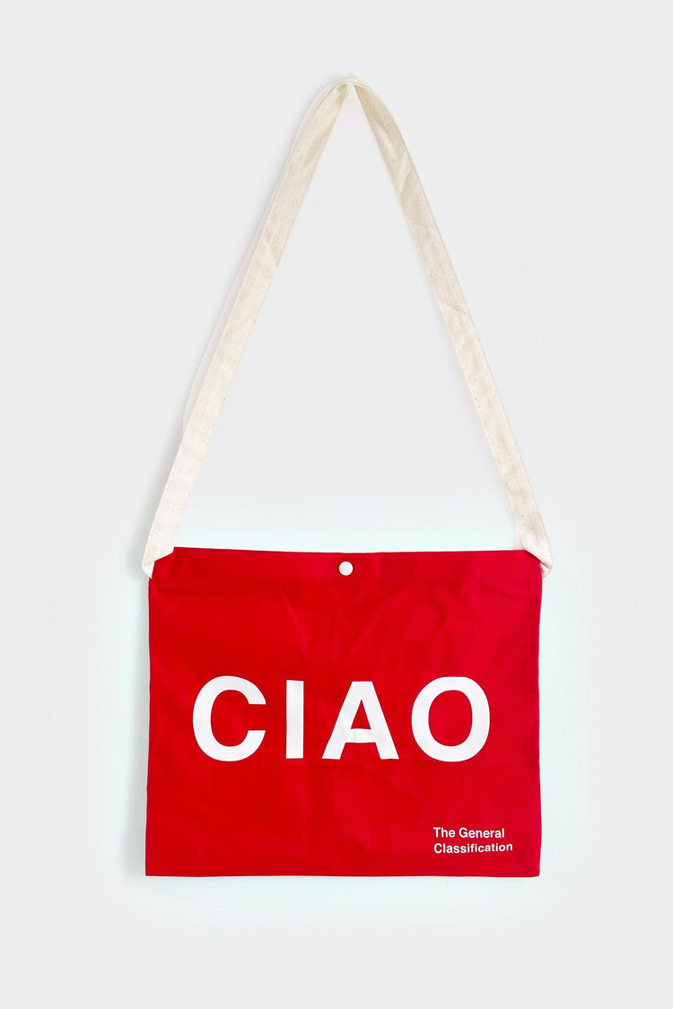 Red reusable canvas tote bag with white handles and bold white "Ciao" and ‘Arrivederci’ graphic by The General Classification. Eco-friendly cotton shopping bag with modern minimalist design, ideal for everyday use, groceries, travel, and casual fashion.