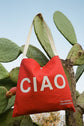 Red reusable canvas tote bag with white handles and bold white "Ciao" and ‘Arrivederci’ graphic by The General Classification. Eco-friendly cotton shopping bag with modern minimalist design, ideal for everyday use, groceries, travel, and casual fashion.