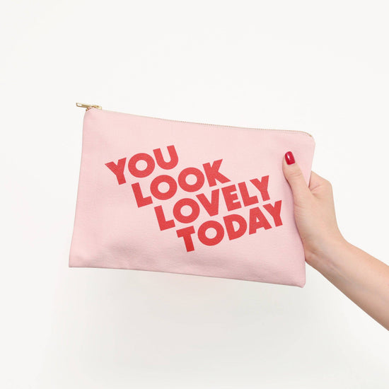 Blush Pink Pouch with ‘You Look Lovely Today’ Text on a White Background