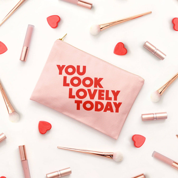 Blush Pink Pouch with ‘You Look Lovely Today’ Text on a White Background