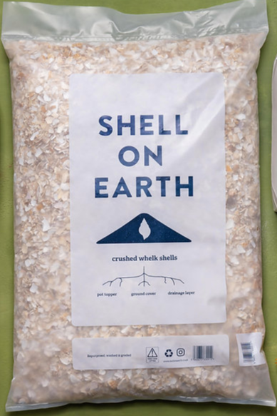 A bag of shell on earth crushed whelk shells