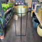 A NKUKU Brass Planter Stand in Urban Tropicana’s store in Chiswick, London.